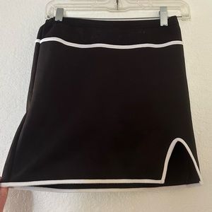 Delia’s x Dolls Kill Black and White Notched Mini Skirt.